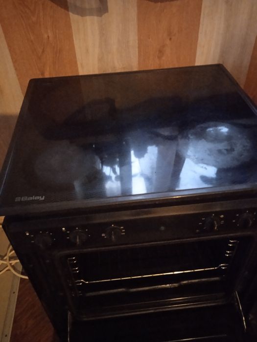 Продам електроплиту з духовкою-б/у