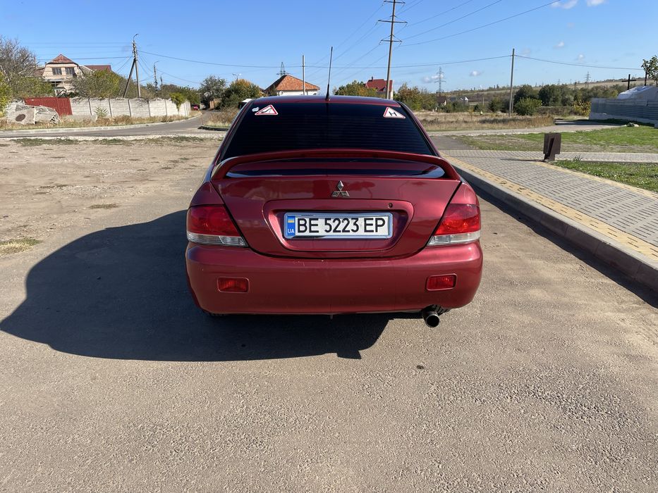 Mitsubishi Lancer газ Автомат
