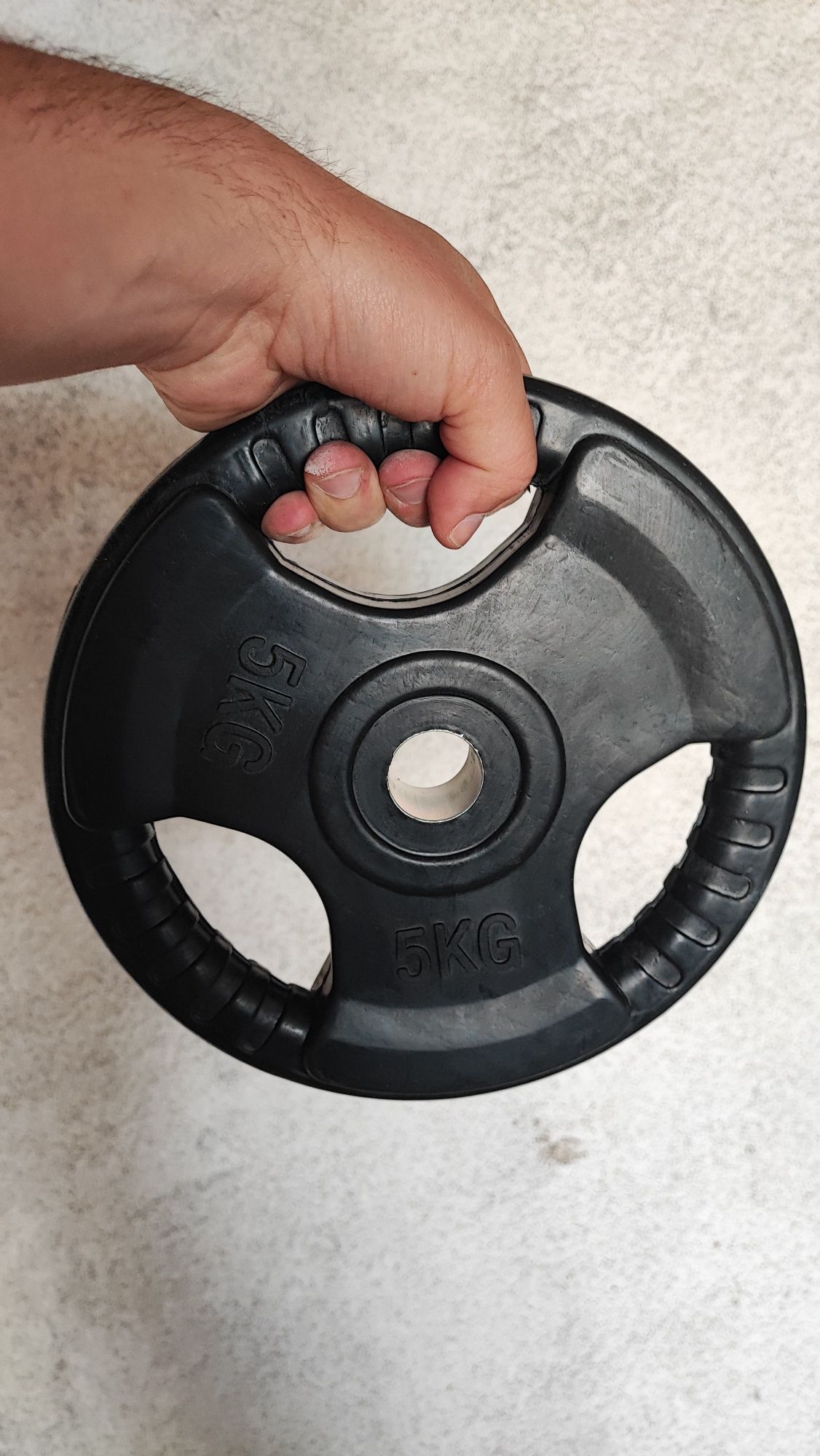 Vendo 10 discos pesos revestidos a borracha, de 5 kg.