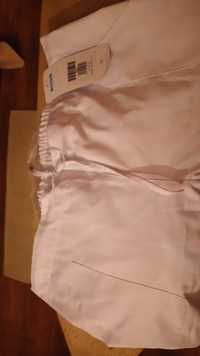 Spodnie medyczne biale 48,posiadam bluzę medyczną II spodniecw pasek