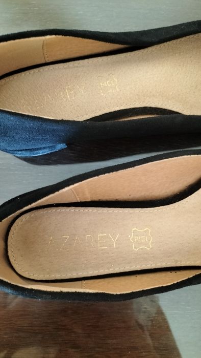 Sapatos rasos elegantes em pele genuína