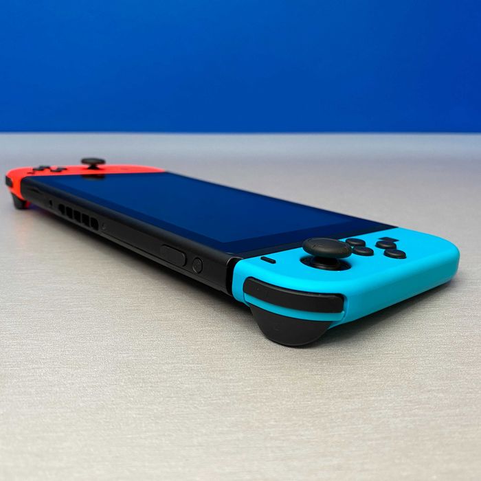 Nintendo Switch V2 (Neon Blue/Red) + Jogos