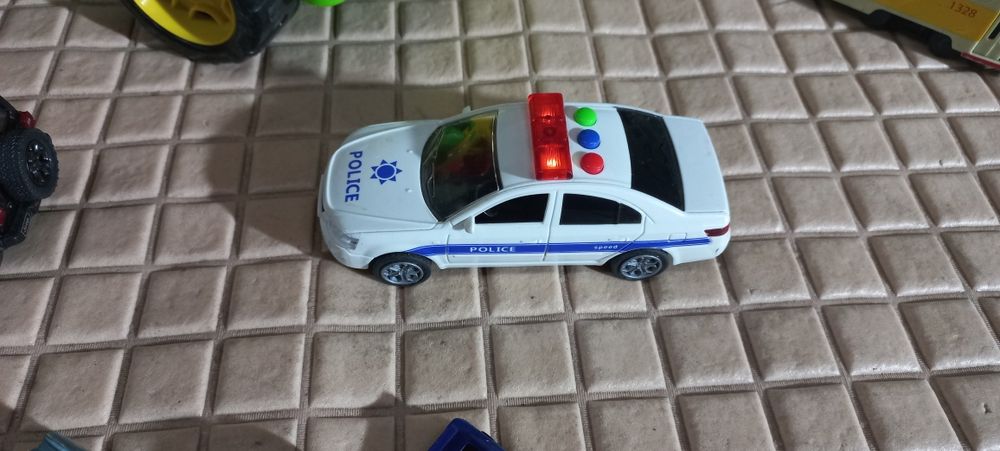 Дитячі іграшкові машинки, трактор, самоскид, трамвай, поліцейське авто