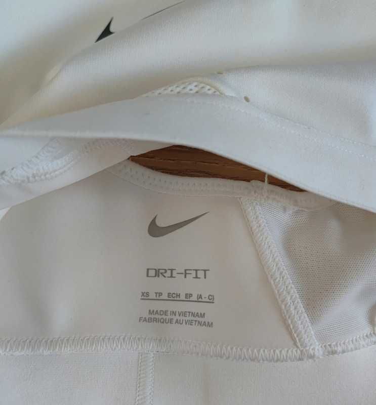 Biały masywny sportowy stanik biustonosz na siłownię Nike rozm XS