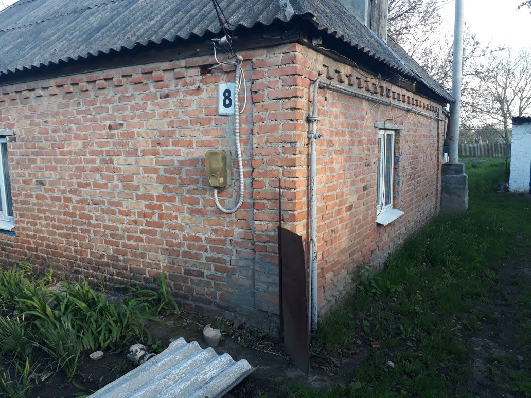 Пів будинку з земельною ділянкою 11/100 м.Хорол