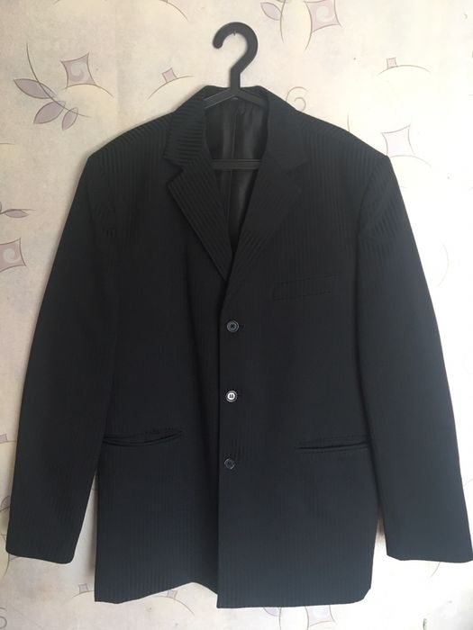 Костюм размер 50-52 состояние нового