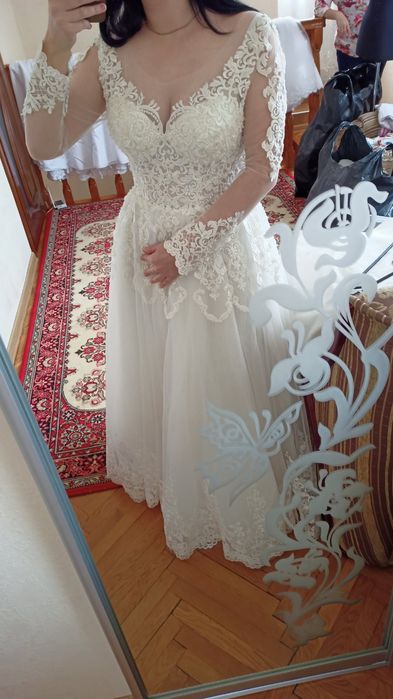 Нові 50 розміру весільні сукні