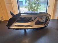 Passat B7 Lampa reflektor lewy przód Valeo, UK