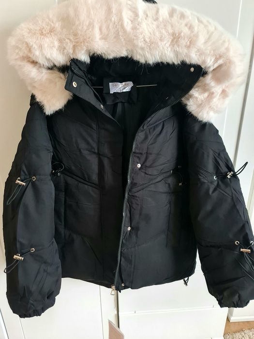 Продам новую куртку- пуховик  зима