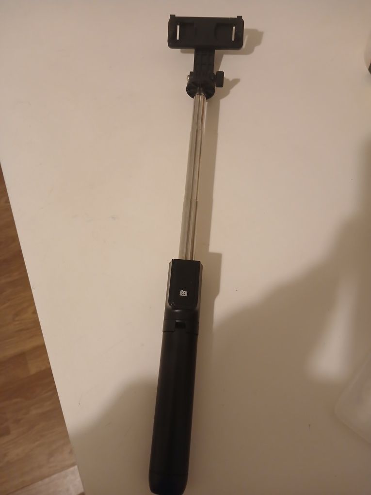 Suporte de mão para o telemóvel para tirar fotos e selfies