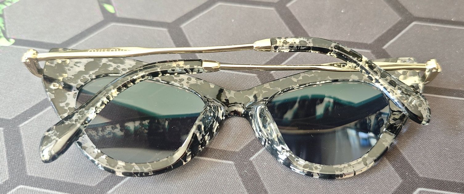 Damskie okulary Miu Miu