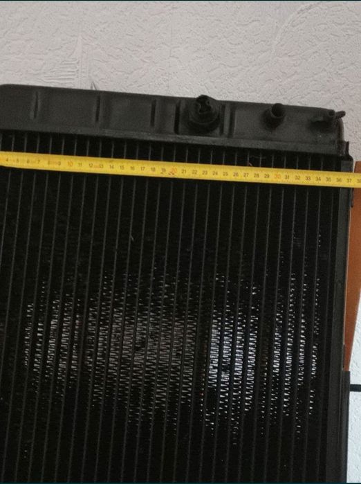 Радиатор москвич 412 2141. Электровентилятор диффузор.
Радиатор новый