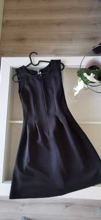Czarna sukienka Calliope sukienka rozmiar L 
Nowa bez metki