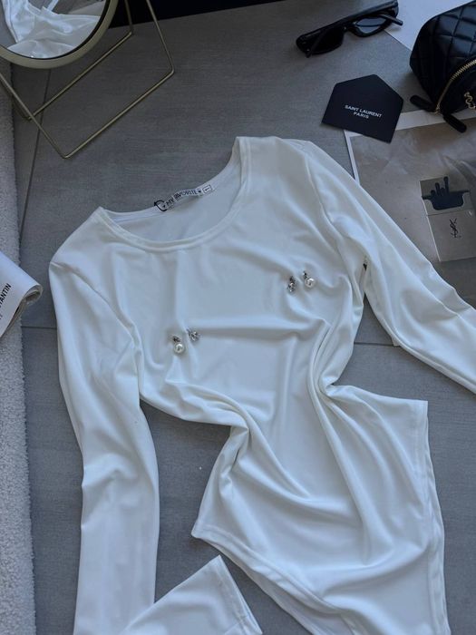 Трендове боді з пірсингом, жіночий бодік з довгим рукавом