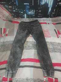 Spodnie jeans wiązane w pasie