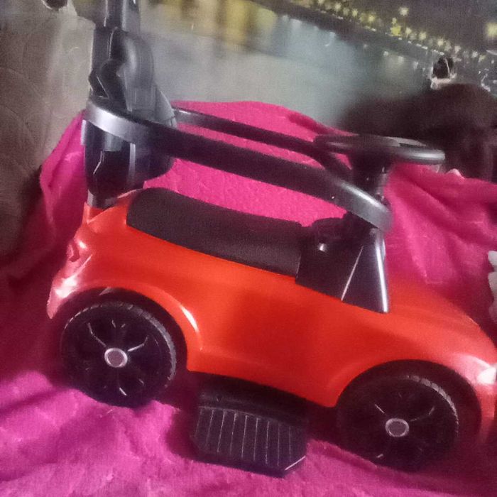 Машина с батьківською ручкою