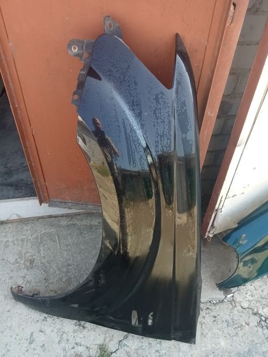 Крыло левое оригинал Митсубиси оутлендер