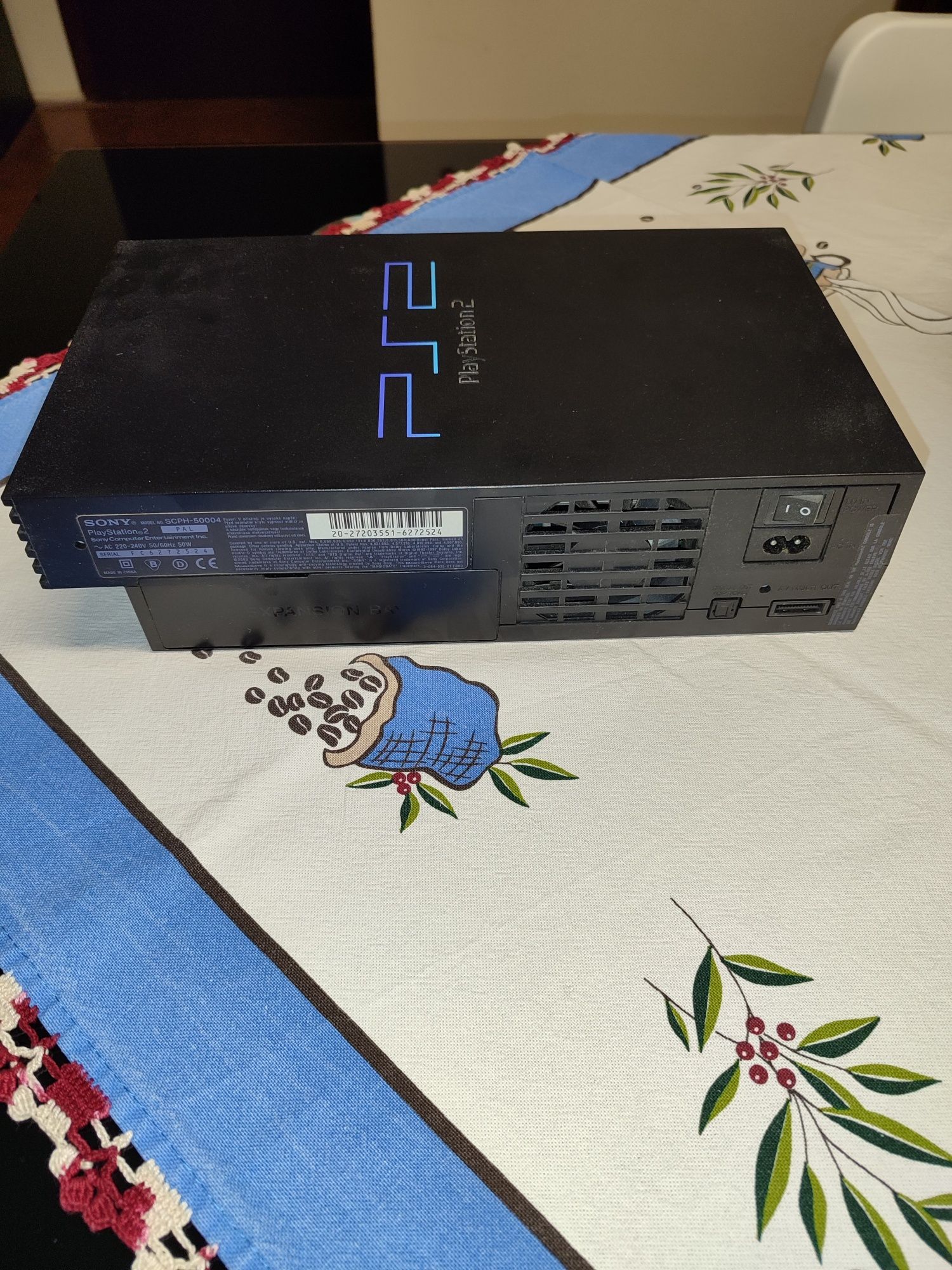 PlayStation 2 com jogos e acessórios