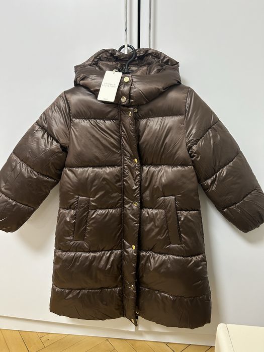 Пуховик Next 128р більшемірить новий