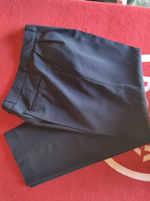 Fato novo completo e  Calças semi novas