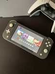 Nintendo Switch Lite + карта 128 gb, купа ігор, кейс