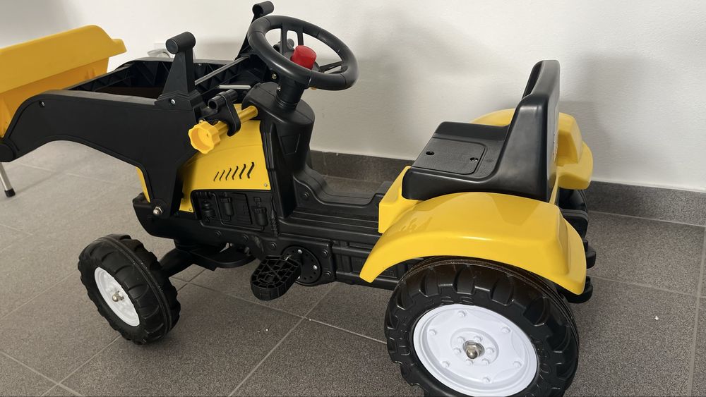 Trator escavadoura criança