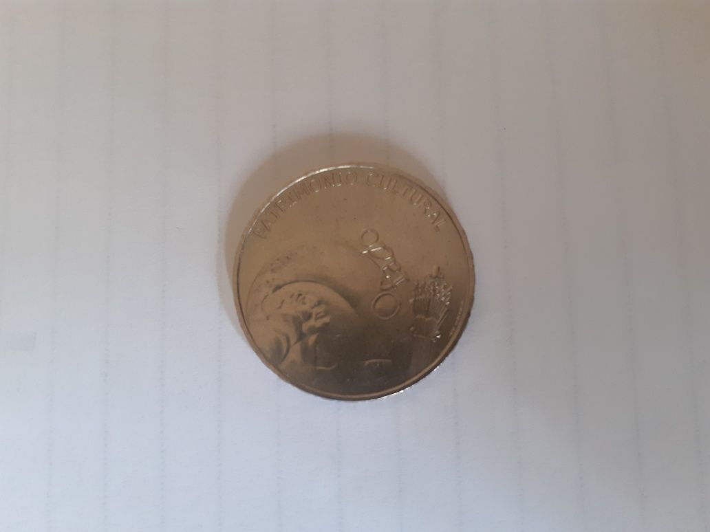 3 moedas de colecção, uma de 5€ em prata, duas de 2,5£