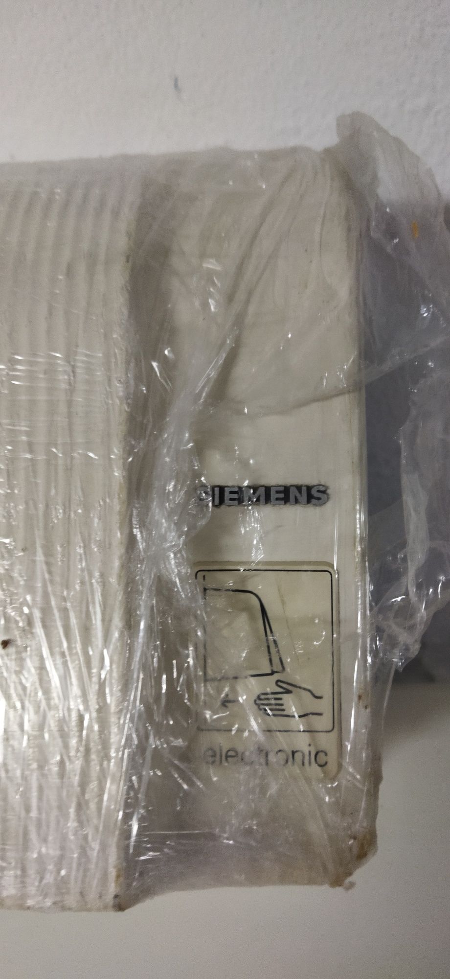 Secador de mão elétrico