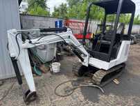 Bobcat 320 мініекскаватор