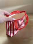 Bolsa riscas vermelha