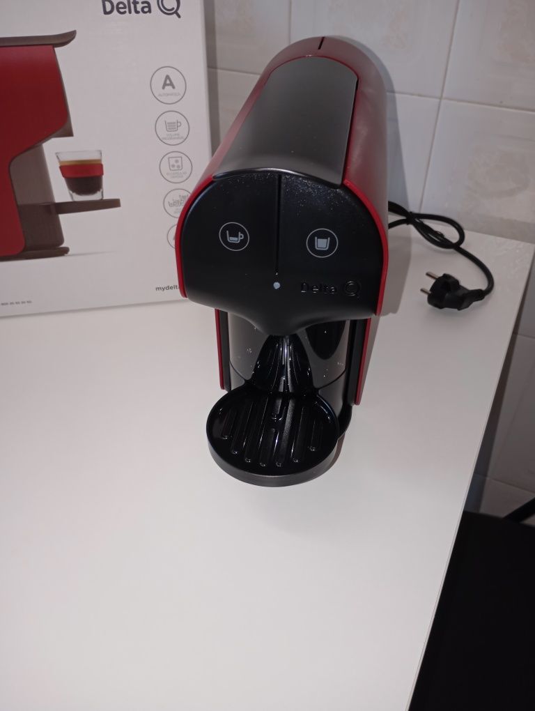 Máquina de café Delta.