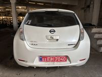 Кришка багажника бампер ліхтар Nissan Leaf колір QAB комплект