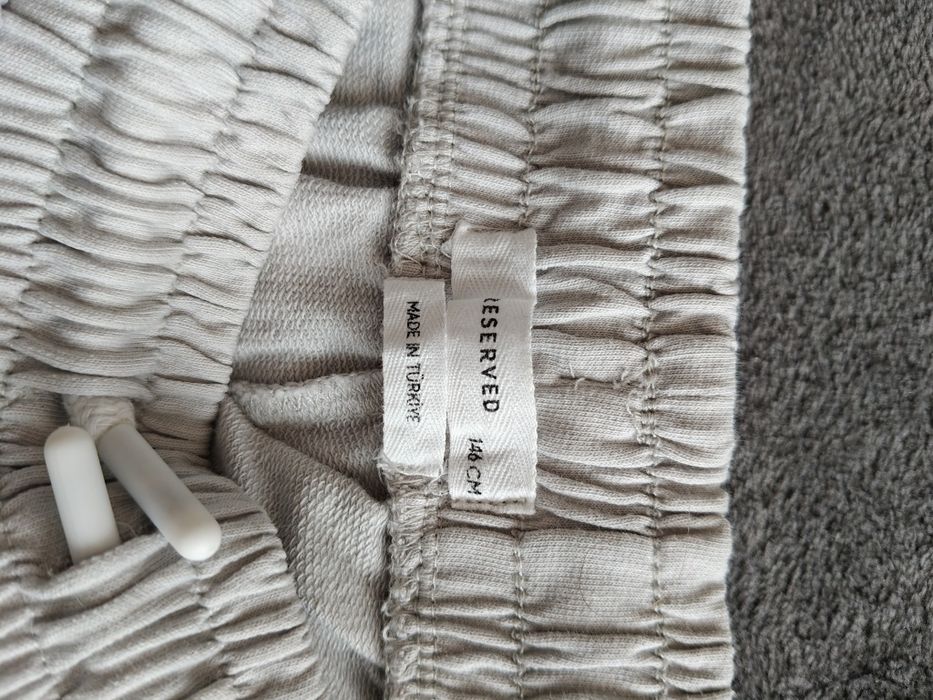 Spodnie dresowe Reserved r. 146