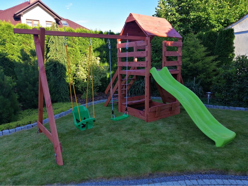 Plac zabaw dla dziecka dzieci domek zjeżdżalnia huśtawka bujaczki