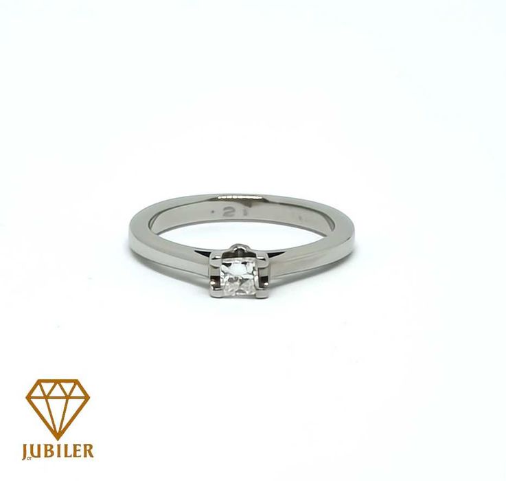 Złoty pierścionek z diamentem 750/0,21ct/certyfikat Jubiler GT