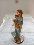 Boneca decorativa em marfinite