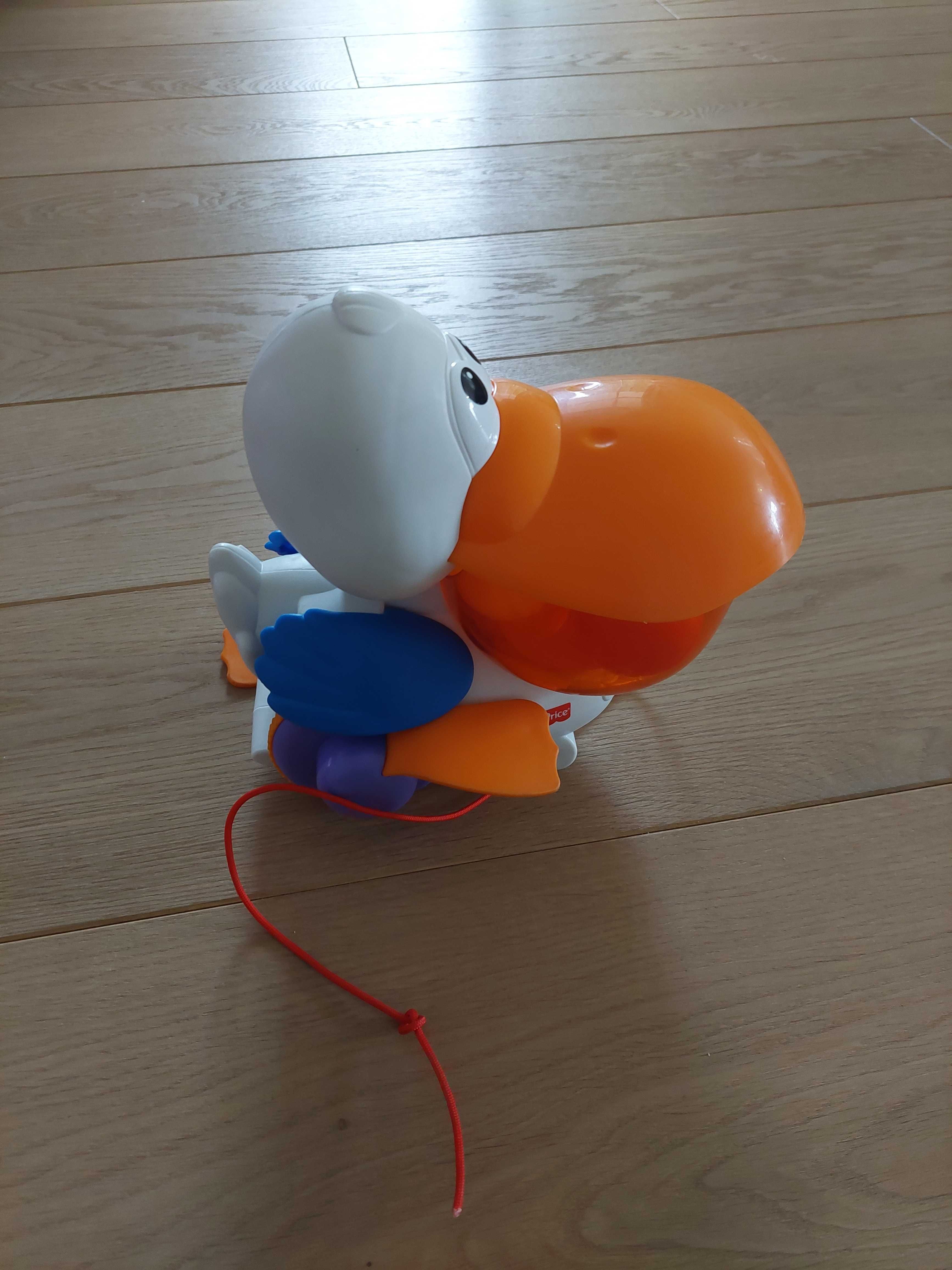 Tukan Fisher Price ptak piłki interaktywny