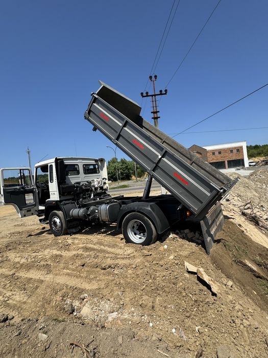 Вивіз сміття з вантажниками