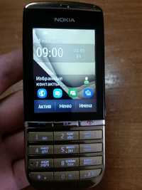 Кнопочно- сенсорный телефон Nokia Asha 300 (5 Mpix, FM, 3G) Нокиа
