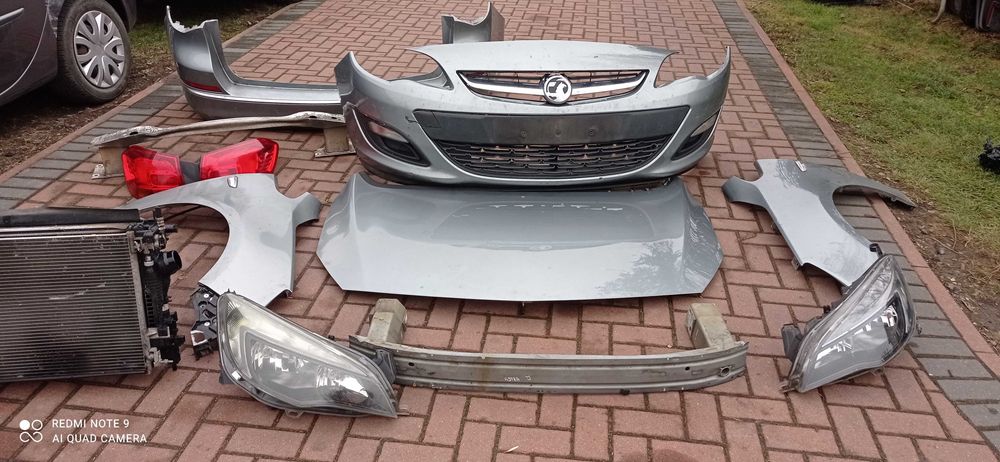Opel Astra J IV Z179 BŁOTNIK maska pas chłodnica belka reflektor