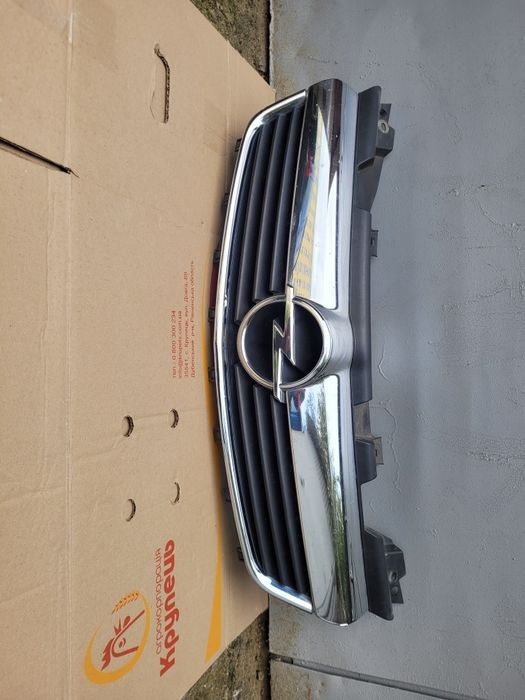 Фари на Opel Zafira B