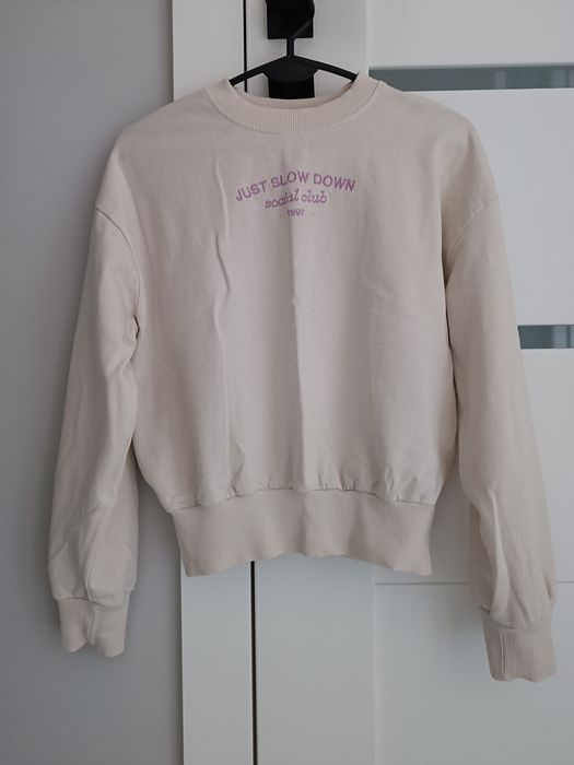 Kremowa bluza rozmiar 152 cm Sinsay