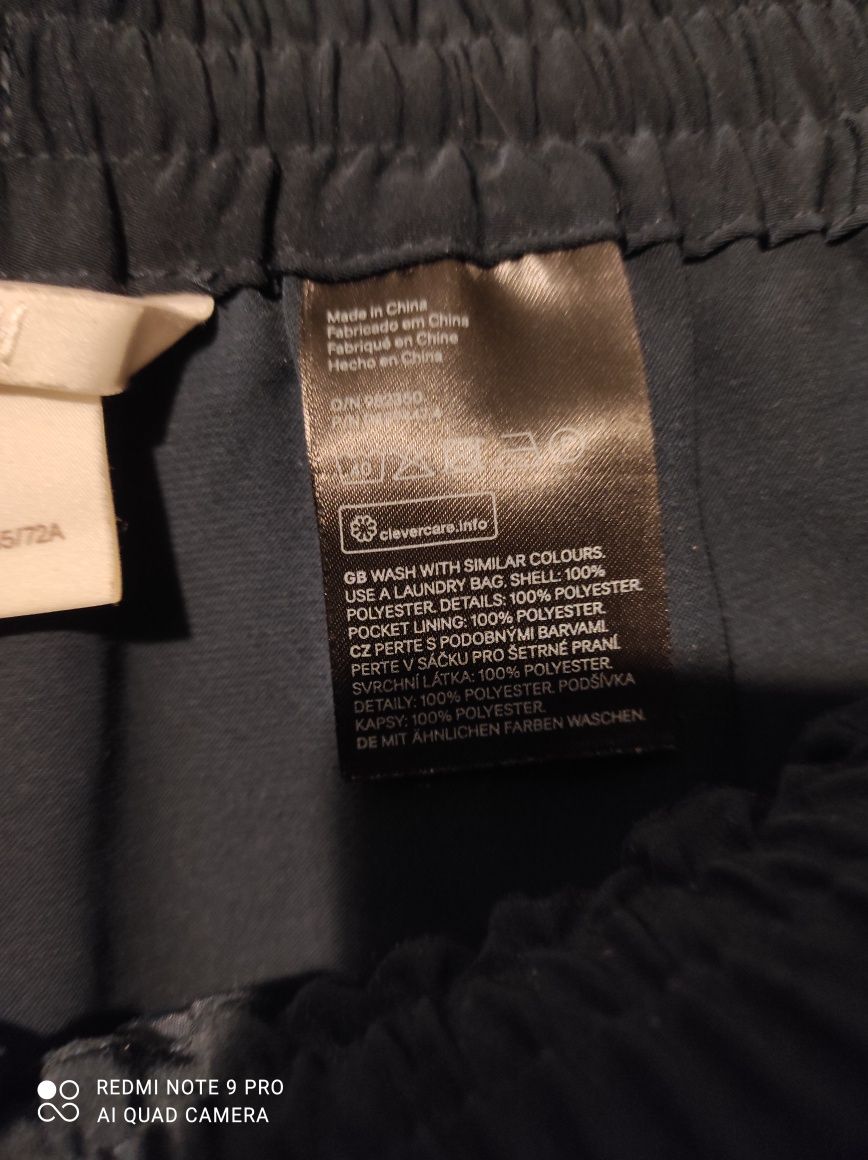Granatowe eleganckie spodnie H&M