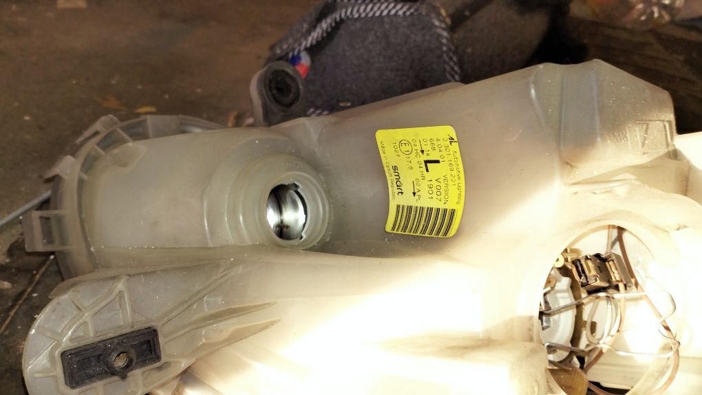 Farol esquerdo Smart 2002