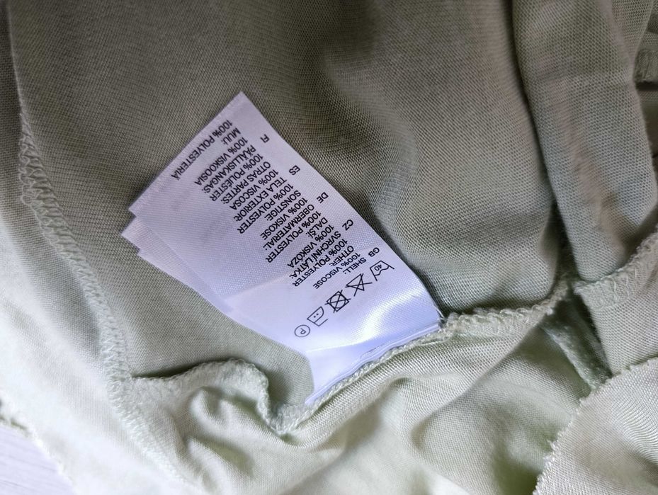 pistacjowa szałwiowa sukienka falbanami L letnia maskuje oponkę brzuch