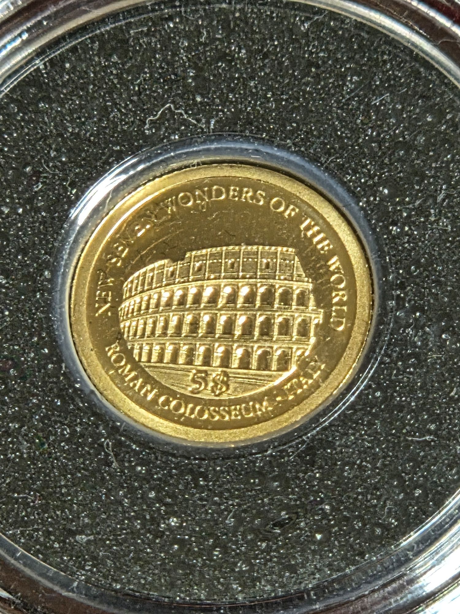 Złota moneta Koloseum 0,5 gr, próba 585