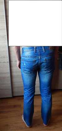 spodnie jeans przecierane rurki new yorker M L