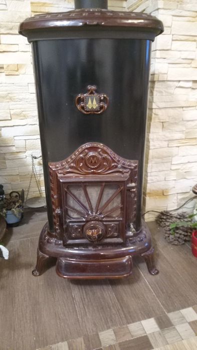 Kominek wolnostojący ozdobny koza ciężki żeliwny