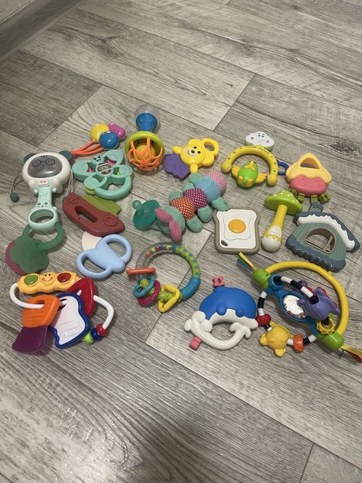 Перші іграшки для малюка Брязкальця Погремушки