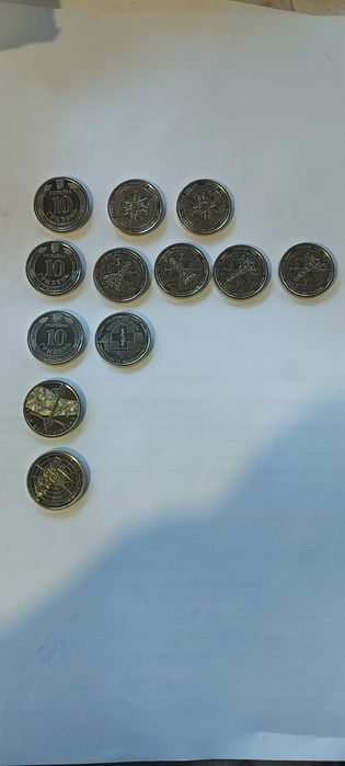 Монеты 10гр колекционные ///